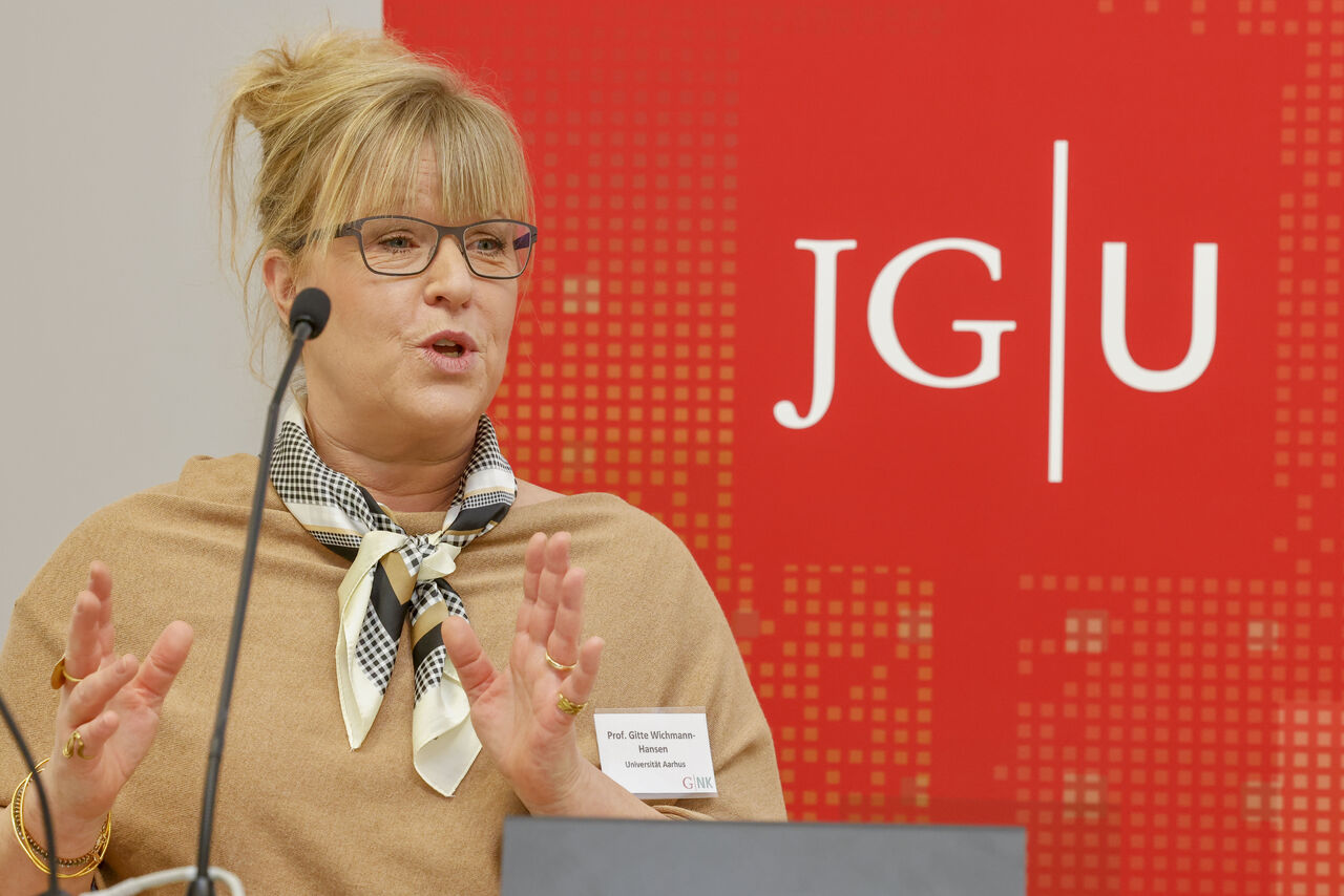 Professor Gitte Wichmann-Hansen presenting a keynote on doctoral supervision
